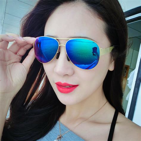 reflective blue sunglasses.